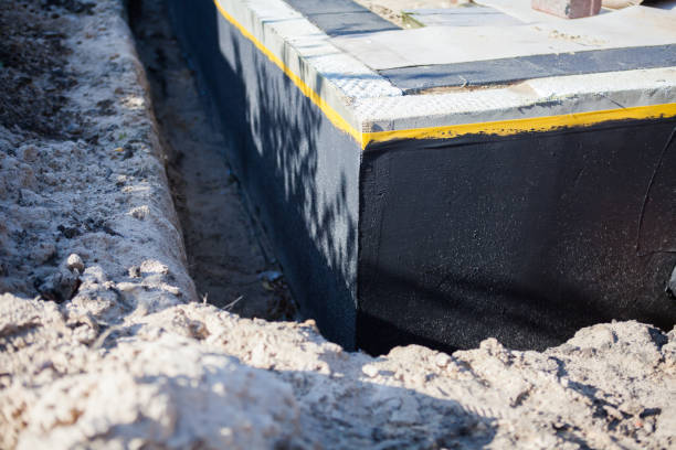 Professional Waterproofing technician working in Pequannock, NJ